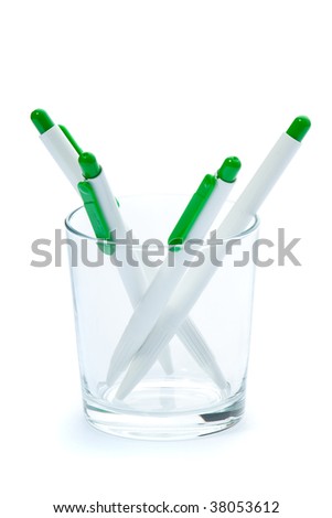 Green pens. Isolated on white. Selective focus.