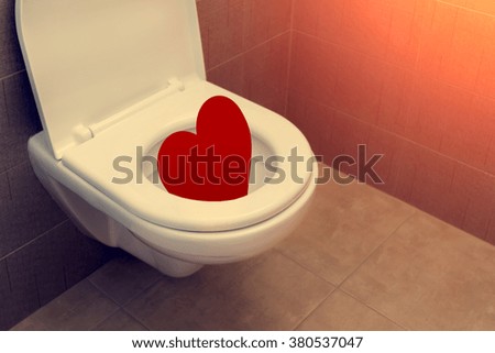 Toilet with heart - symbol of Valentine's Day