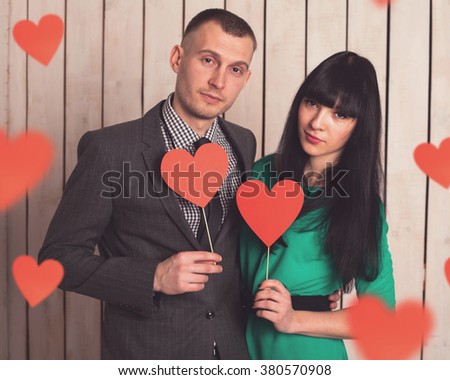 Couple of man and woman with shape of red heart. Love in Valentine's day.