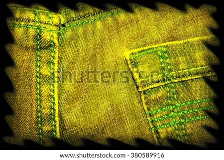Texture of yellow jeans as a background