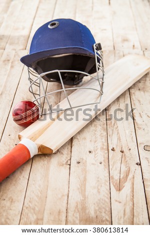 Cricket Equipment on wooden table