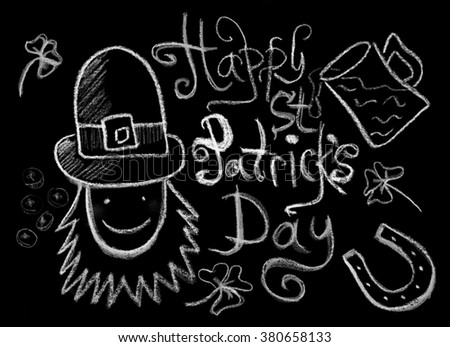 St. Patrick's Day - drawing with chalk on a blackboardd with chalk
