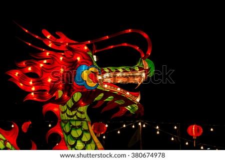 head of Chinese dragon; abstract background.