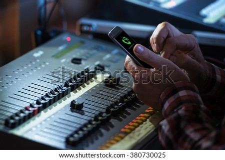 Sound Mixer Operator Incoming Phone Call. Audio Mixing Job.