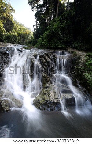 Paradise waterfall in Tropical rain forest of Thailand , water fall in deep forest at Chantaburi province Thailand . 