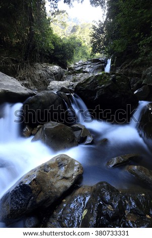 Paradise waterfall in Tropical rain forest of Thailand , water fall in deep forest at Chantaburi province Thailand . 