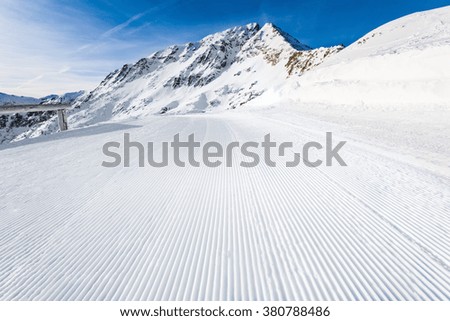 top of the ski slopes are prepared trail snowcat