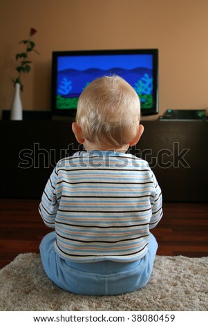 11 months old baby boy watching television