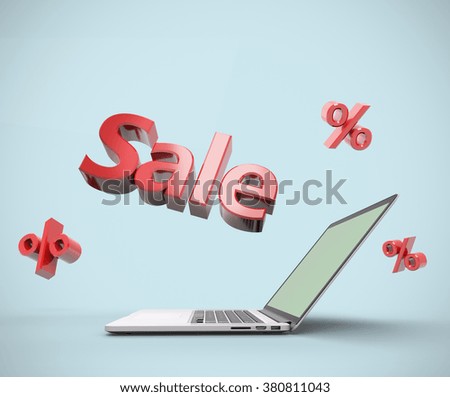 Open laptop with Sale label jutting out from its display. Clipping path for display included.