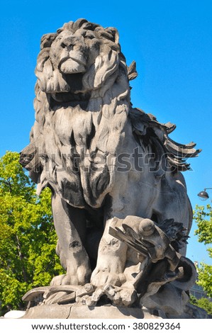 Architectural detail of statue depicting lion in Paris
