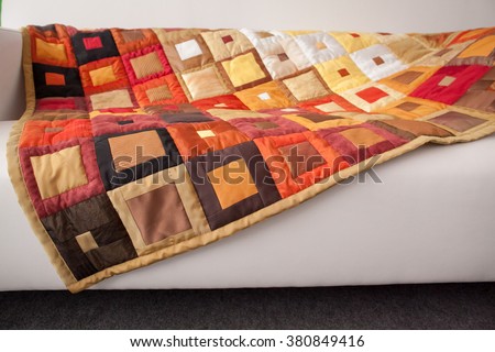 Patchwork quilt. Part of patchwork quilt as background. Klimt print. Color blanket. Handmade. 