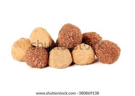 Sweet chocolate truffle isolated on a white