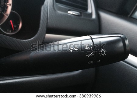 Modern car interior detail or adjusting speed of screen wipers in car