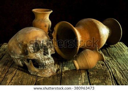 Still Life with a Skull and vase,earthenware