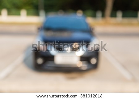 Abstract blurred car in parking area at the public park