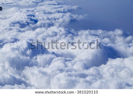 Blue Sky and White clouds on Airplane