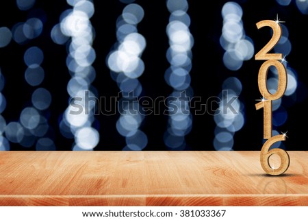 2016 year gold scratch number in perspective room with sparkling bokeh wall and wooden plank floor