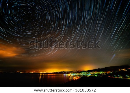 beautiful sky at night over izola with startrails
 Royalty-Free Stock Photo #381050572