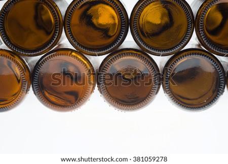 Beer bottles of brown glass background