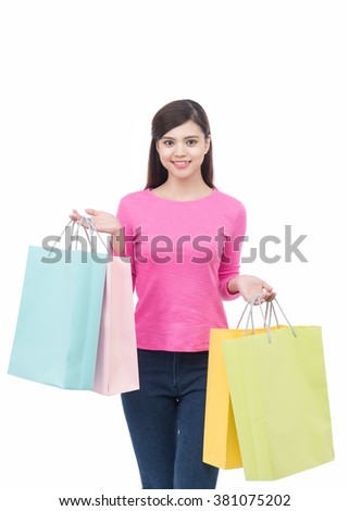 Picture of lovely asian woman with shopping bags, isolated over white background