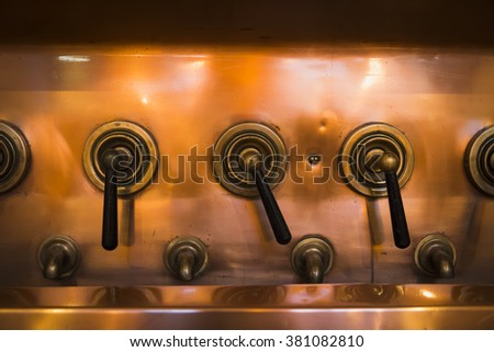 old arms antique copper beer factory Royalty-Free Stock Photo #381082810