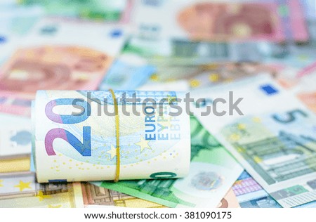 Colorful background with new series of euro currency,money banknotes,Focus on number 20 of currency roll