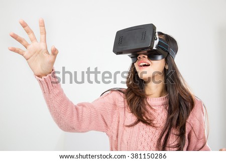 portrait of asian woman wearing virtual reality goggle