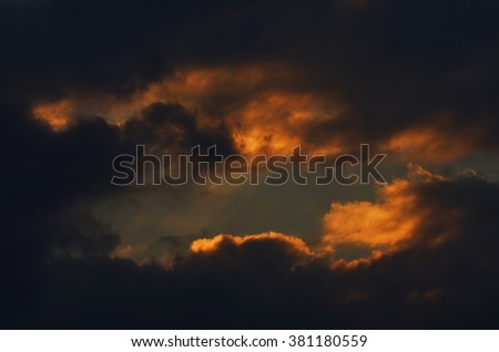 Sun light shining through the dark cloud