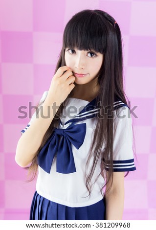 school girl student cosplay in pink background japanese style