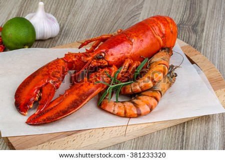 Big cooked lobster and tiger shrimps ready for eating