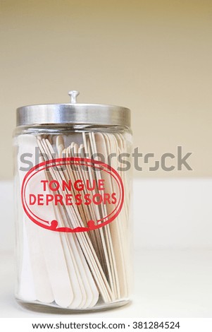 Jar of tongue depressors