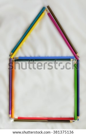 Colorful pencils, tied together, different colors