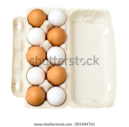 Top view of opened box of ten white and brown chicken eggs for market place or shop isolated on white background. Package of ten raw chicken eggs for meal or other health food. 