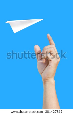 paper aero plane ready to take off as a conceptual picture on blue background