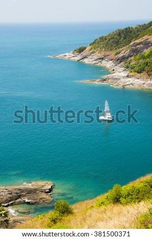 Phuket island, Thailand. Andaman Sea landscape with rocks and yacht