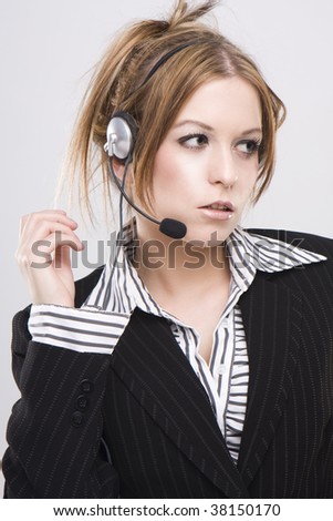 Customer support operator woman speaking to the customers - isolated