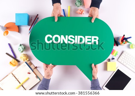 Two people holding speech bubble with CONSIDER concept
