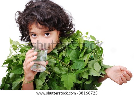 Little cute girl in leaves dress isolated