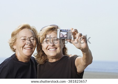 Women taking a picture of themselves
