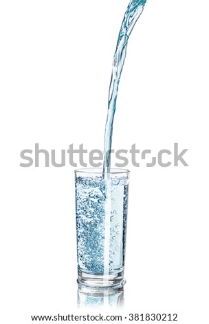 a strong pouring water pouring into a glass isolated on white background