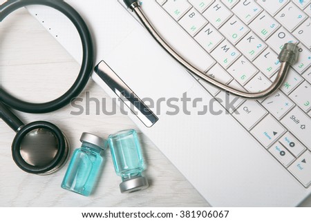 medical equipment with a laptop on the table