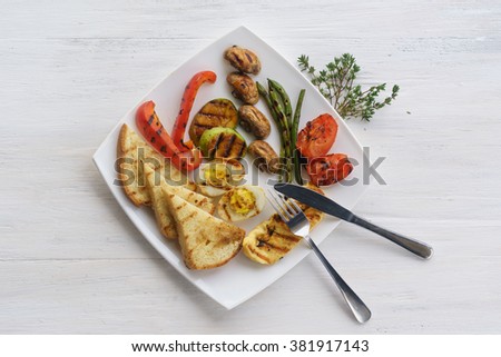 Breakfast with grilled vegetables and bread