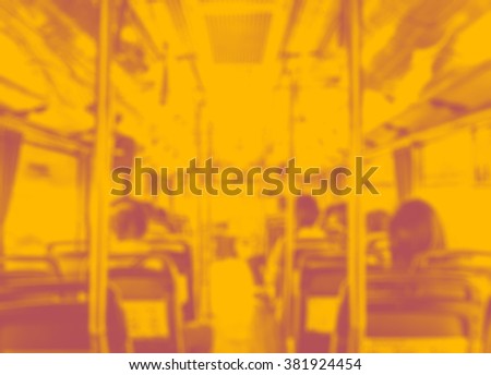 Abstract blur background, Inside of public bus with seat and people in duo tone color style