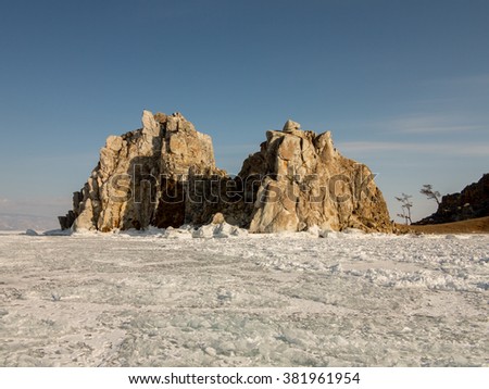 Shamanka Rock on Olkhon island in Baikal lake.Winter. Russia.