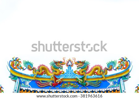 Chinese style Twin dragons statue on the roof of Chinese temple isolated white background