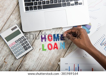 hand arranging home loan concept photo