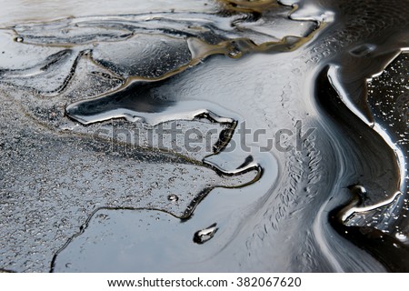 crude oil surface background textured Royalty-Free Stock Photo #382067620