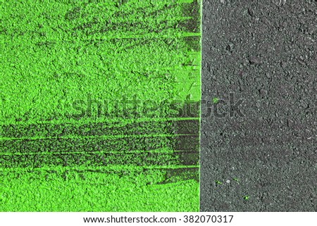 road background with crossing of green white road marking and tire. Line On New Asphalt Road texture background. black asphalt texture. background texture of rough asphalt. Hot fresh asphalt
