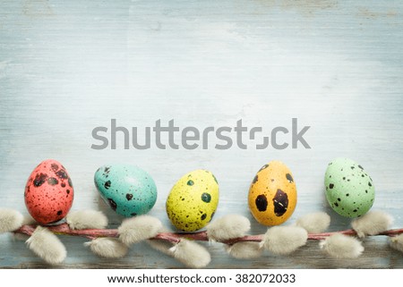 Easter eggs and catkins retro blue background