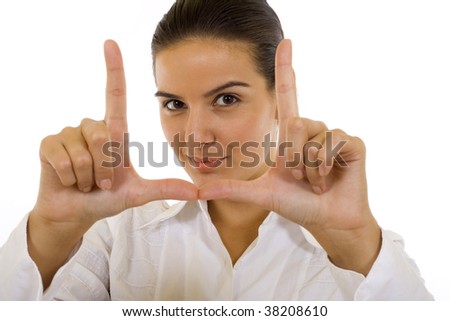 Portrait of a happy young woman making a snapshot sign